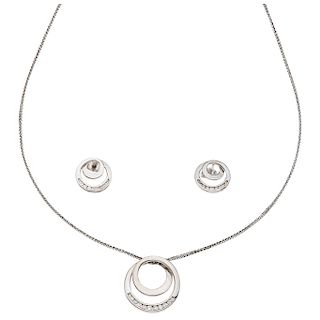A diamond 14K white gold choker, pendant and pair of stud earrings set.