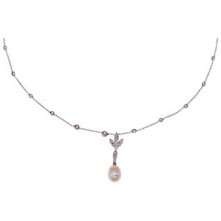 A cultured pearl and diamond 14K white gold necklace and pendant.