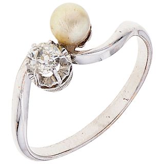A cultured pearl and diamond 14K white gold ring.