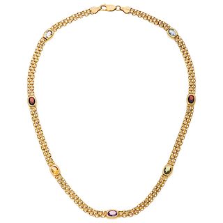 A topaz, garnet, citrine, amethyst and peridot 14K yellow gold necklace.