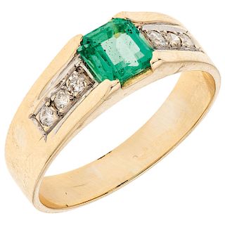 An emerald and diamond 14K yellow gold ring.
