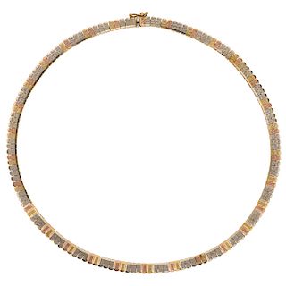 An 18K white, yellow and rose gold choker.