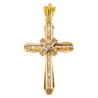A diamond 14K yellow gold cross pendant.