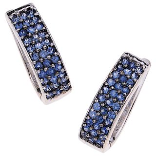 A sapphire 14K white gold pair of earrings.