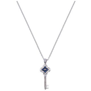 A 14K white gold necklace and 10K white gold sapphire and diamond pendant.