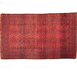 Tapete. S. XX. Estilo Bokhara. Elaborado en fibras de lana y algodón. Decorado con motivos romboidales en color negro sobre fondo rojo.