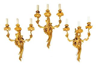 Three Louis XV Style Gilt Bronze Three-Light Sconces Height 24 inches.