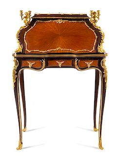 A Louis XV Style Gilt Bronze Mounted Slant-Front Writing Desk Height 42 1/2 x width 29 1/4 x depth 20 3/4 inches.