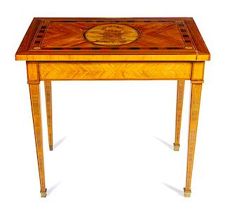 A Louis XVI Style Marquetry Table Height 29 x width 32 x depth 21 1/2 inches.