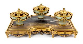 * A French Gilt Bronze, Celadon Porcelain and Japanese Lacquer-Inset Encrier Height 6 3/8 x width 16 1/4 inches.