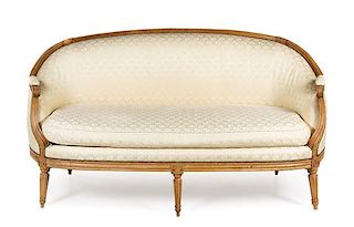 A Louis XVI Style Upholstered Canape Height 36 1/2 x width 67 5/8 x depth 35 inches.