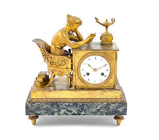 An Empire Gilt Bronze and Marble Mantel Clock Height 12 1/2 x width 11 1/2 x depth 5 1/2 inches.