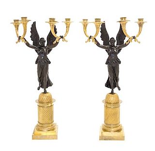 A Pair of Empire Gilt and Patinated Bronze Four-Light Candelabra Height 24 1/2 inches.