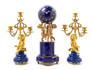 A French Lapis Lazuli and Gilt Bronze Clock Garniture Height of mantel clock 16 1/4 inches.
