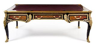 A Napoleon III Style Gilt Bronze Mounted Faux Boulle Marquetry Bureau Plat Height 33 1/2 x depth 42 1/2 inches.