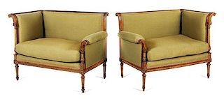 A Pair of Napoleon III Carved Walnut Settees First example: height 33 1/8 x width 43 x depth 24 1/2 inches.