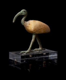 * An Egyptian Bronze and Alabaster Ibis Height 5 1/2 inches.