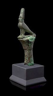 * An Egyptian Bronze Horus Finial Height 4 1/4 inches.