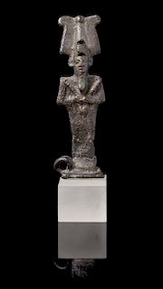 * An Egyptian Bronze Amulet of Osiris Height 2 3/4 inches.