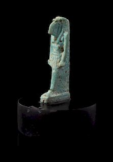 * An Egyptian Faience Amulet of Thoth Height 2 1/8 inches.