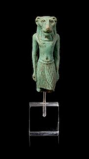 * An Egyptian Faience Amulet of Mahes Height 2 1/4 inches.