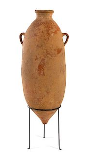* A Roman Terra Cotta Transport Amphora Height 48 inches.