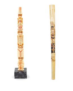 A Pair of Northwest Coast Carved Walrus Tusk Articles Height of taller 12 inches.