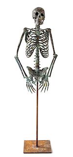A Bronze Skeleton Figure Height overall 58 1/2 inches.