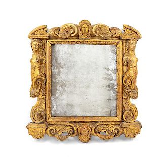 An Italian Giltwood Mirror Height 22 x width 20 inches.