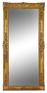 A Continental Giltwood Mirror Height 75 1/4 x width 36 1/2 inches.
