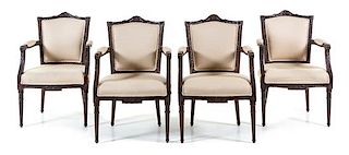 A Set of Four Dutch Mahogany Armchairs Height 37 1/2 inches.
