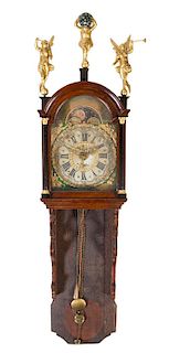 * A Dutch Oak Wall Clock Height 60 inches.