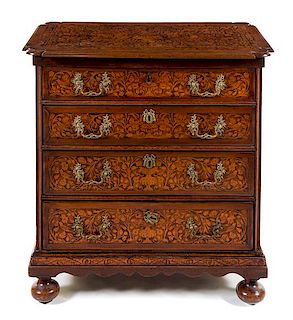 A Dutch Marquetry Chest of Drawers Height 34 x width 33 x depth 19 1/2 inches.