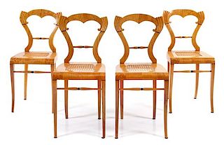 A Set of Four Biedermeier Side Chairs Height 35 3/8 inches.