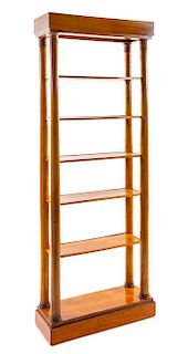 A Swedish Neoclassical Birch Etagere Height 78 1/4 x width 28 x depth 9 3/4 inches.