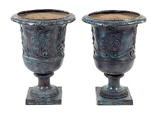 A Pair of Neoclassical Style Painted Cast Iron Planters Height 28 inches.