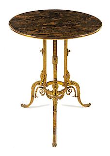 A Neoclassical Style Gilt Bronze and Lacquered Side Table Height 37 x diameter of top 26 1/2 inches.