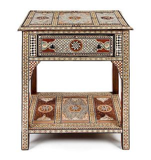 A Moorish Mother-of-Pearl Inlaid Side Table Height 33 x width 29 1/2 x depth 21 1/4 inches.