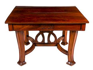 An Italian Art Nouveau Style Walnut Dining Suite Height of table 31 1/2 x width 47 1/2 (closed) x depth 40 1/4 inches.