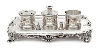 An English Silver Ink Stand, Paul Storr, London, 1788, of rectangular form with rounded corners, the central candle stand flanke