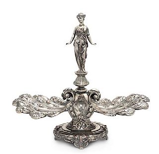 An English Silver-Plate Centerpiece Height 15 1/2 x width 16 3/4 inches.