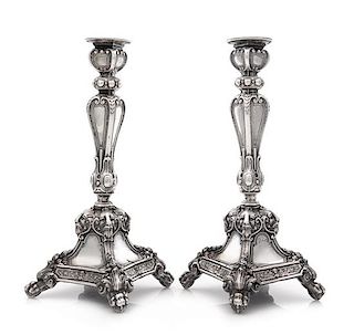 A Pair of Austrian Silver Candlesticks, Maker's Mark HS, Vienna, 19th Century, each stem of paneled baluster form with foliate a