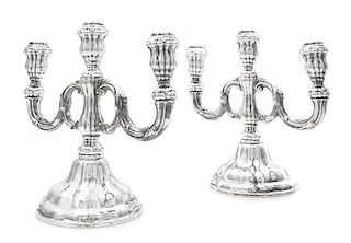 A Pair of German Silver Three-Light Candelabra, Gebruder Deyhle, Schwabisch Gmund, 20th Century, each stem issuing two scrolling