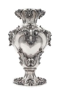 A Portuguese Silver Vase, Porto, First Half 20th Century, of baluster form with applied rocaille and foliate decoration.