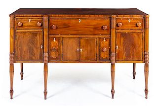 An American Mahogany Sideboard Height 41 1/2 x width 69 x depth 25 3/4 inches.