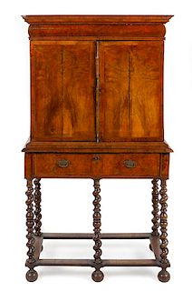 * A William and Mary Burl Walnut Cabinet on Stand Height 63 1/2 x width 35 x depth 19 inches.