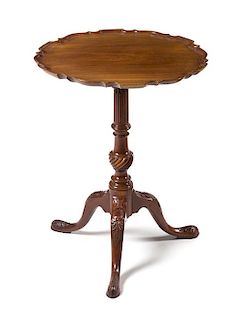 A George II Mahogany Tripod Table Height 26 x diameter of top 20 inches.