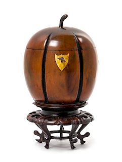 A George III Fruitwood Melon-Form Tea Caddy Height of tea caddy 5 1/2 inches.