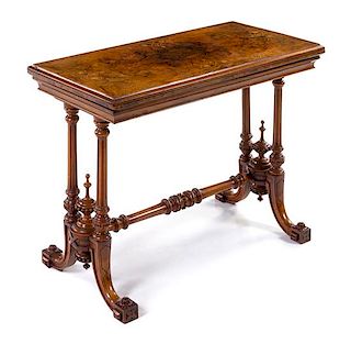 A Victorian Burlwood and Marquetry Game Table Height 28 1/4 x width 38 x depth 18 3/4 inches (closed).