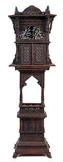 An Anglo-Indian Pierce Carved Shrine Cabinet Height 68 x width 20 1/2 x depth 8 3/4 inches.